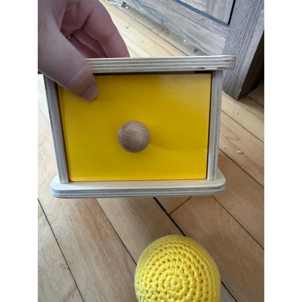 Monti Kids motor planning wooden yellow‎ box with drawer and yellow knit ball